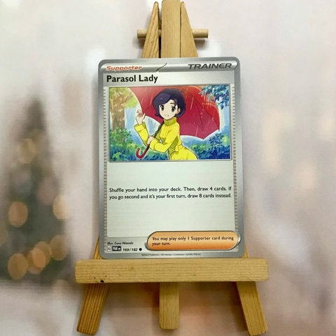 Thẻ hình Pokemon Parasol Lady 169/182 - Lá bài lẻ Paradox Rift Common Reverse Holo tiếng Anh chính hãng