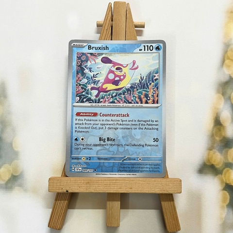 Thẻ hình Pokemon Bruxish 049/191 - Lá bài lẻ Surging Sparks Uncommon Reverse Holo tiếng Anh chính hãng