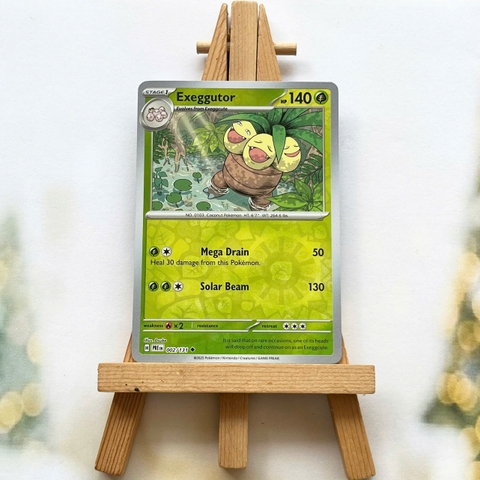 Thẻ hình Pokemon Exeggutor 002/131 - Lá bài lẻ Prismatic Evolutions Uncommon Reverse Holo tiếng Anh chính hãng