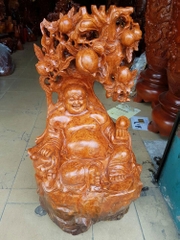 Di Lặc ngồi gốc đào nu gõ 80x50x38