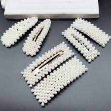 KẸP MÁI HỌT XOÀN ẤN NÚT TRẮNG (1 VỈ =10 CÁI)