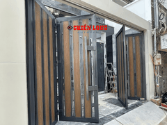 Mẫu cửa cổng 4 cánh xếp ốp nhựa Gỗ nguyên sinh + Bề mặt phủ PVDF/ASA, chống tia UV