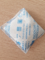 gói chống ẩm silica gel vải xanh