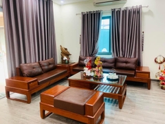 Sofa gỗ gõ chân hươu bên trái