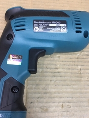 Máy khoan cầm tay Makita M6000B