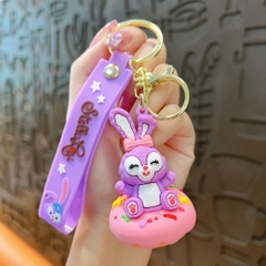 móc khóa thỏ tím ngồi bánh - Dây móc dài : 11cm - Mô Hình Cao : 7cm - Nặng : 50gram - No Box : bọc túi OPP K79-T1-S12