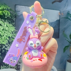 móc khóa thỏ tím ngồi bánh - Dây móc dài : 11cm - Mô Hình Cao : 7cm - Nặng : 50gram - No Box : bọc túi OPP K79-T1-S12