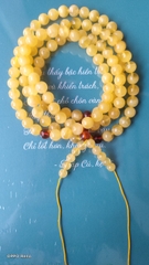 Chuỗi hổ phách mina màu vàng kem