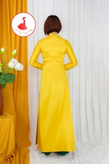 Áo dài màu vàng đính kết hoa sen cổ 3cm vải lụa Vân Gỗ