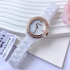 Coach Rose Gold |Nữ Giới |Mặt Xà Cừ Hoa |Dây Đá Ceramic Trắng |Máy Pin (Quartz) |Size 32mm
