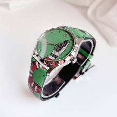 Gucci G-Timeless Textured |Nữ |Mặt Đầu Rắn |Dây Da Xanh Lá |Máy Pin (Quartz) |Size 38mm
