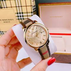 Burberry The Classic Round |Nữ Giới |Vàng Gold |Dây Vải Bọc Da Nâu |Máy Pin (Quartz) |Size 32mm