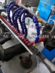 Máy đùn lò xo  nhựa bọc ống thủy lực