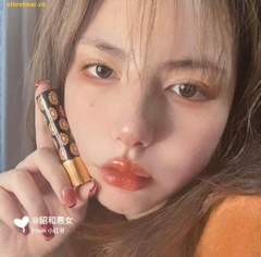 Son Dưỡng Gucci 307 Louise Orange Cam Cháy