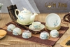 Bộ trà ba chân Công men kem vẽ hoa đào vàng kim