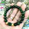 Vòng Tay Diopside 3A Mix lu thống Ngọc bích và 2 Bi Vàng 9999