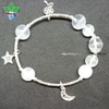 Vòng tay thạch anh trắng charm bạc 925