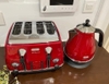 Nướng bánh mỳ 4 lát Delonghi màu đỏ