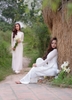 ao-dai-trang-voi-hoa-loa-ken-1