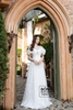 Váy cưới tùng trễ vai nhún trắng kim sa tròn VSRD131