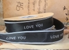 Ruybang vải kt 2.5cmx 35m - chữ love you in màu đen-nền TRẮNG.