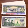 Tiền con trâu Lào 1000 Kip
