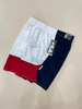 quan-thoi-trang-fila-essentials-basketball-white-navy-red-shorts-fe100-hang-chin