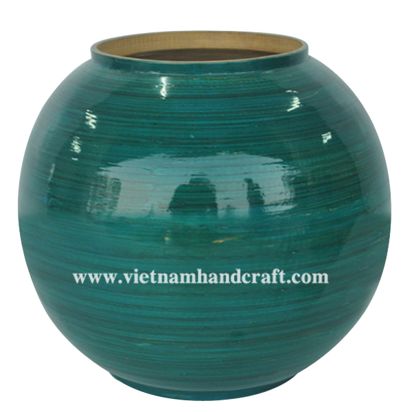 Ball shaped coiled bamboo vase. Inside in natural bamboo, outside hand lacquered in blue Ball shaped coiled bamboo vase. Inside in natural bamboo, outside hand lacquered in blue
