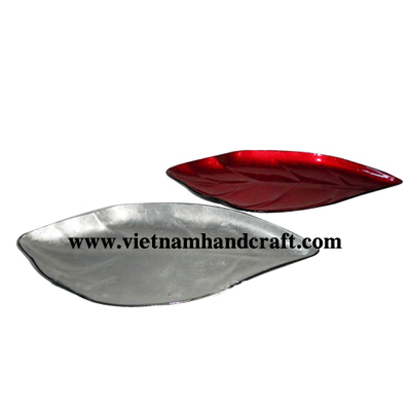 Leaf shaped lacquer plates. Inside in white and red silver leaf.  outside in black Leaf shaped lacquer plates. Inside in white and red silver leaf.  outside in black
