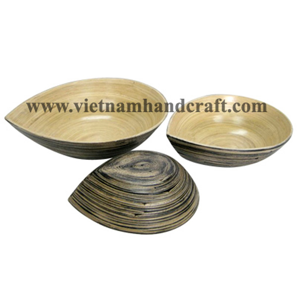 Natural mango-shaped bamboo dinner bowl with black effects outside Natural mango-shaped bamboo dinner bowl with black effects outside