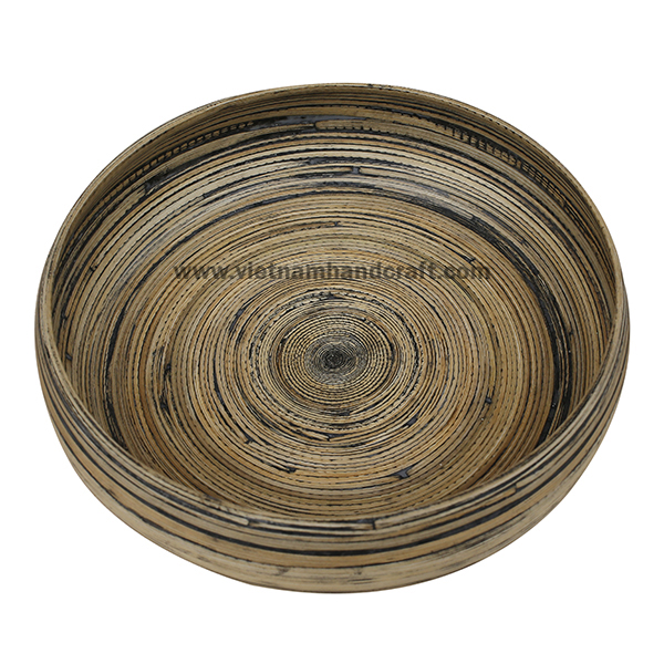 Handcrafted coiled bamboo fruit bowl in natural with black effects Handcrafted coiled bamboo fruit bowl in natural with black effects