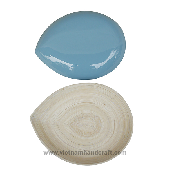 Handmade bamboo snack dish. Inside in natural, outside in blue Handmade bamboo snack dish. Inside in natural, outside in blue