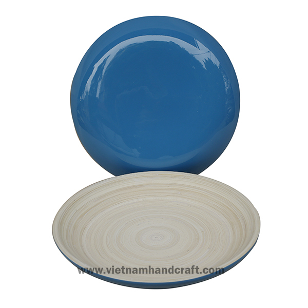 Handmade coiled bamboo serving tray. Inside in natural, outside in blue Handmade coiled bamboo serving tray. Inside in natural, outside in blue