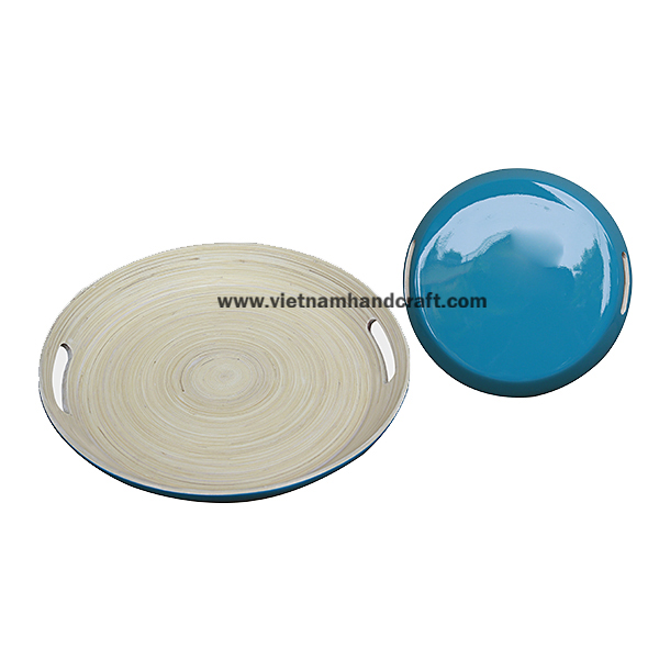 Handmade coiled bamboo tray with handles. Inside in natural, outside hand lacquered in blue Handmade coiled bamboo tray with handles. Inside in natural, outside hand lacquered in blue