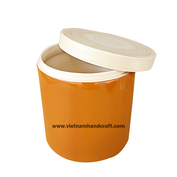 Handmade bamboo storage canister. Lid & inside in natural, outside hand lacquered in orange Handmade bamboo storage canister. Lid & inside in natural, outside hand lacquered in orange