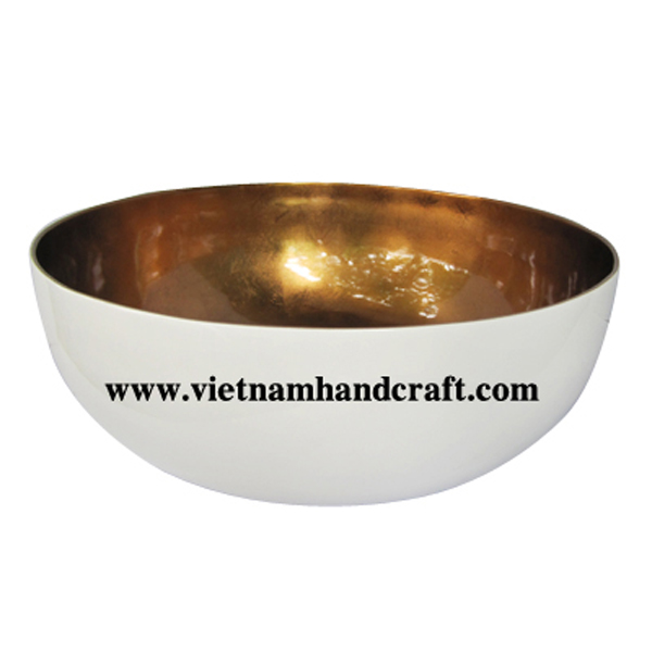 Lacquered decorative bowl. Inside in silver metallic bronze, outside in solid white Lacquered decorative bowl. Inside in silver metallic bronze, outside in solid white