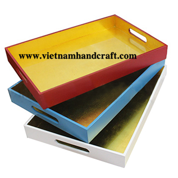 Wooden lacquerware desk trays. Insides in gold silver leaf, outsides in various solid colors Wooden lacquerware desk trays. Insides in gold silver leaf, outsides in various solid colors