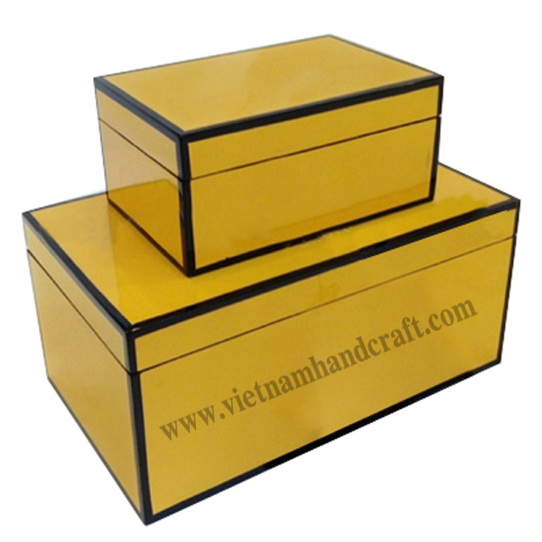 Lacquered wood decorative box in yellow with black rims Lacquered wood decorative box in yellow with black rims