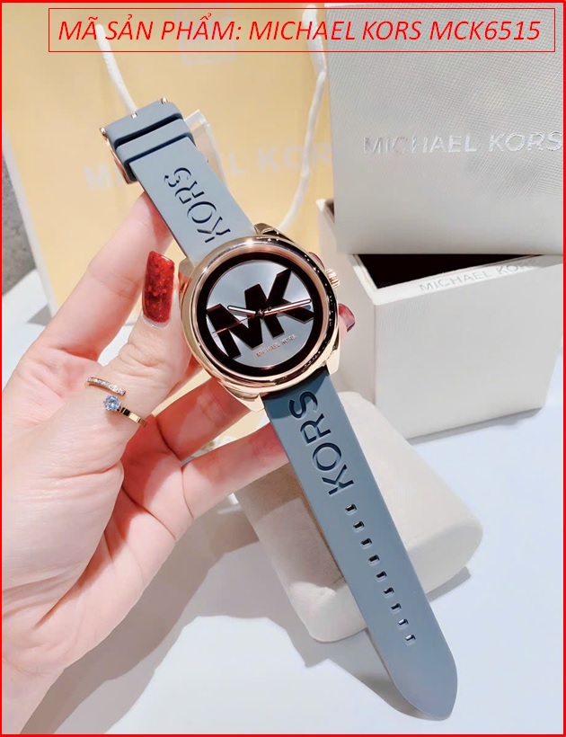 dong-ho-nu-michael-kors-janelle-mat-hoa-tiet-logo-sillicone-xam-timesstore-vn