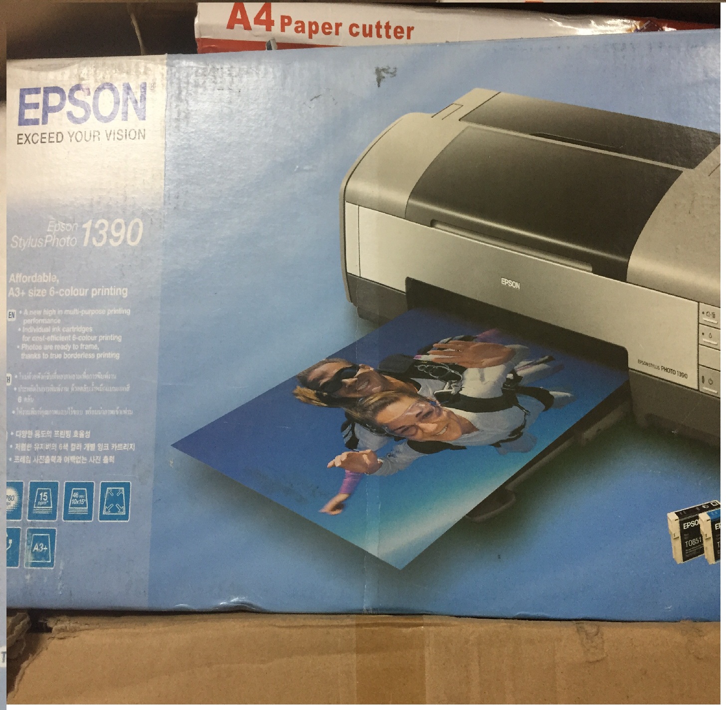 Máy in Epson 1390 xuất Nhật tặng 1 tập giấy ảnh Epson