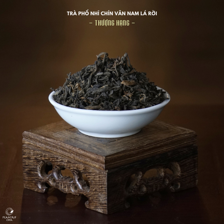 Hình dáng lá trà khô của Trà Phổ Nhĩ Chín Vân Nam Lá Rời.