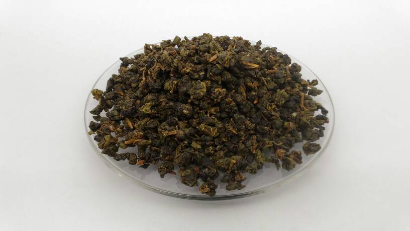 Trà Oolong Rang Plantrip Cha mang mùi trà rang rất đặc trưng, hương vị khói lửa đốt đồng, mước trà có màu nâu đậm, vị trà ngọt ngào đậm đà - Ảnh: Sưu tầm