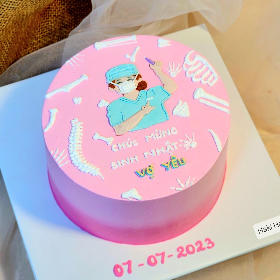 Bánh kem vẽ hình y tá - bác sỹ