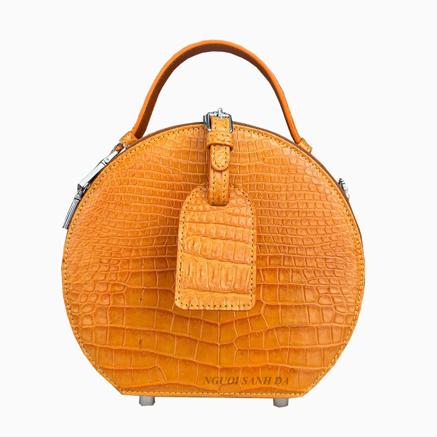 Túi tròn da bụng cá sấu màu vàng cam