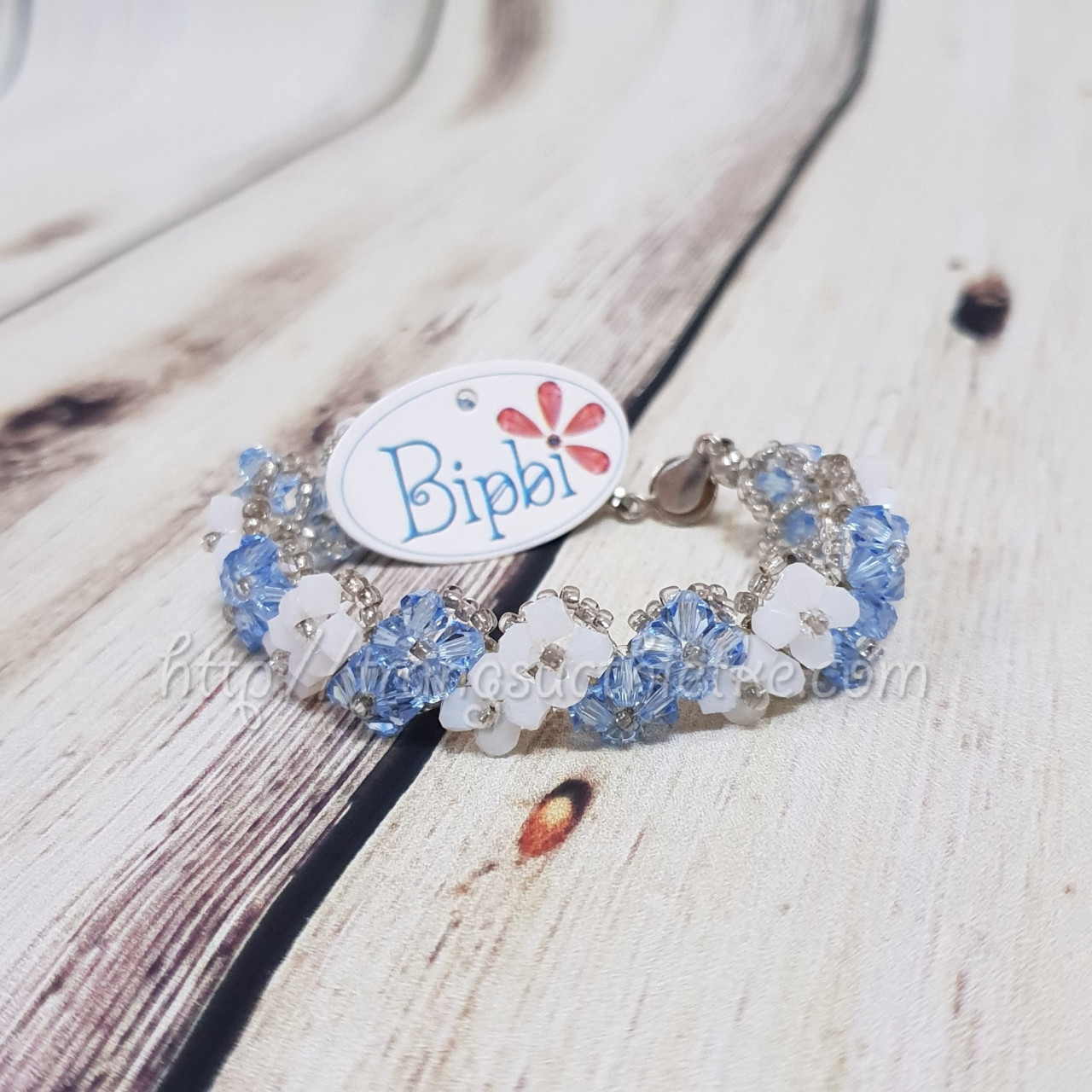 Vòng tay pha lê Swarovski xanh dương - trắng