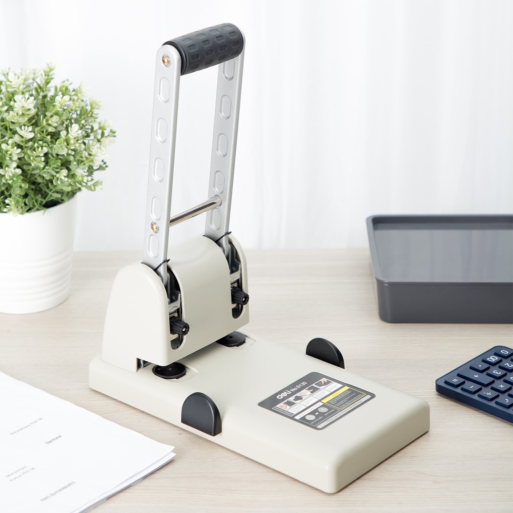 Máy đục lỗ Deli E0130 -100 tờ