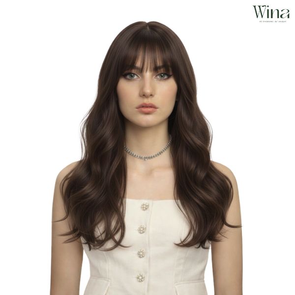 Với khu&ocirc;n mặt d&agrave;i hoặc tr&aacute;n cao th&igrave; n&ecirc;n chọn c&aacute;c kiểu t&oacute;c giả c&oacute; m&aacute;i