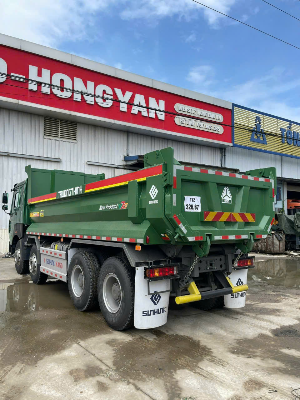 XE BEN HOWO 4 CHÂN THÙNG U V7G NHẬP KHẨU