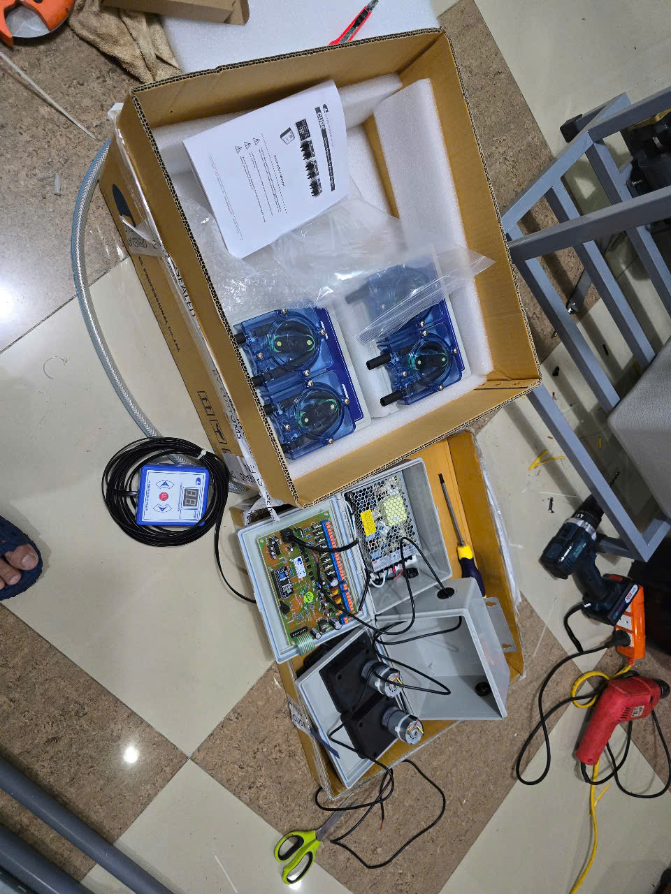 Bơm định lượng hóa chất giặt là Bơm định lượng hóa chất giặt là