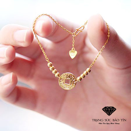 Lắc tay nữ kim tiền vàng 10k là lựa chọn hoàn hảo để nâng cao phong cách thời trang của bạn. Hãy xem hình ảnh này và cảm nhận sức mạnh của món đồ trang sức đẳng cấp này!